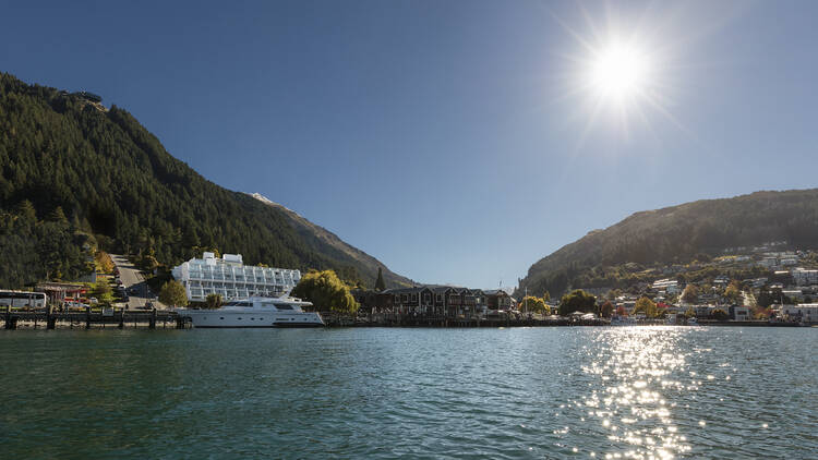 Sun shining over lake
