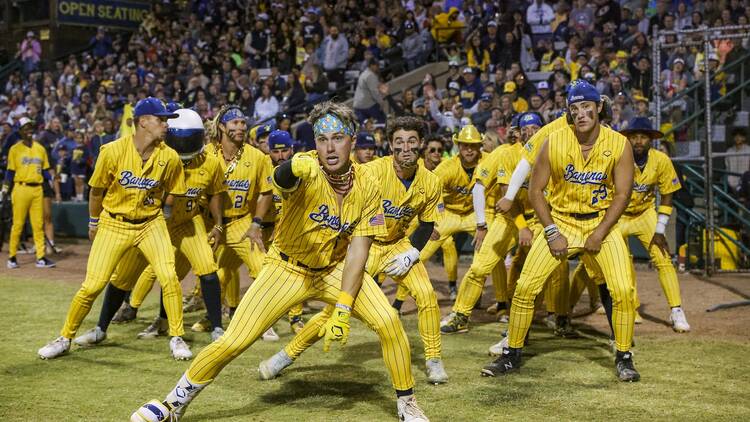 The Savannah Bananas dance in a ballpark.