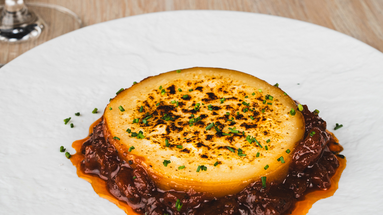 A plate of smoked saganaki cheese.