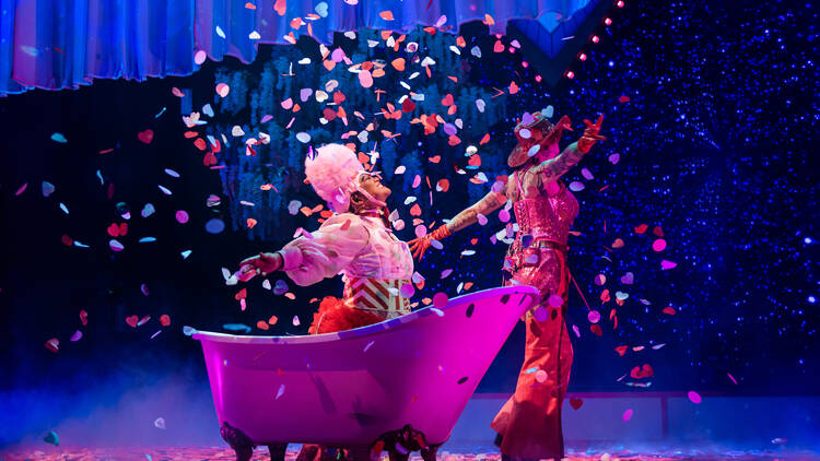 The Lovers Two performers on stage with confetti falling