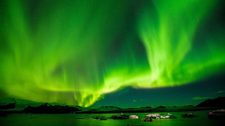 Green lights in night sky