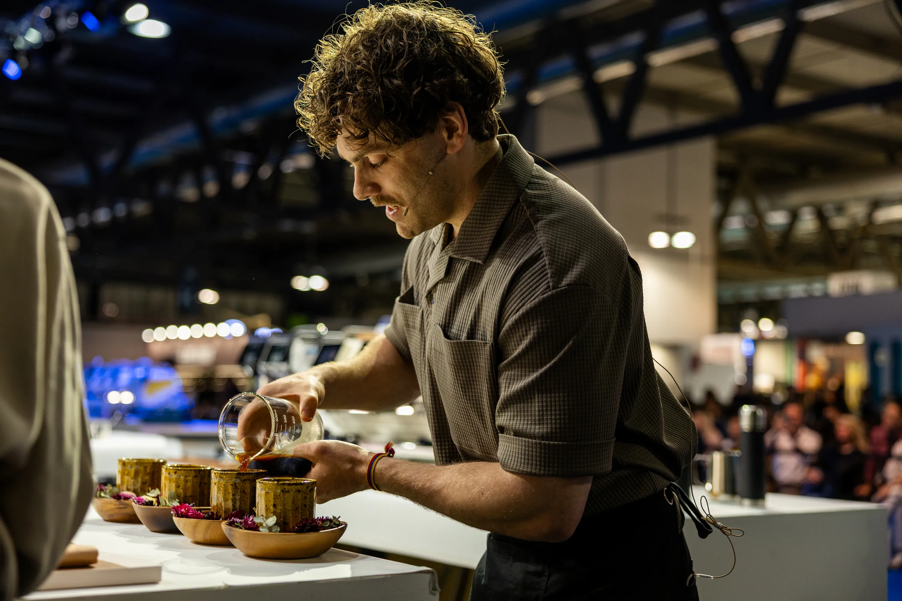 Barista Jack Simpson making coffees.