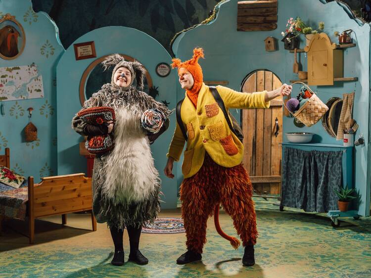Colorful children’s theatre scene at Ahaa Theatre in Tampere featuring animal costumes and a whimsical storybook-style set. Colorful children’s theatre scene at Ahaa Theatre in Tampere featuring animal costumes and a whimsical storybook-style set.