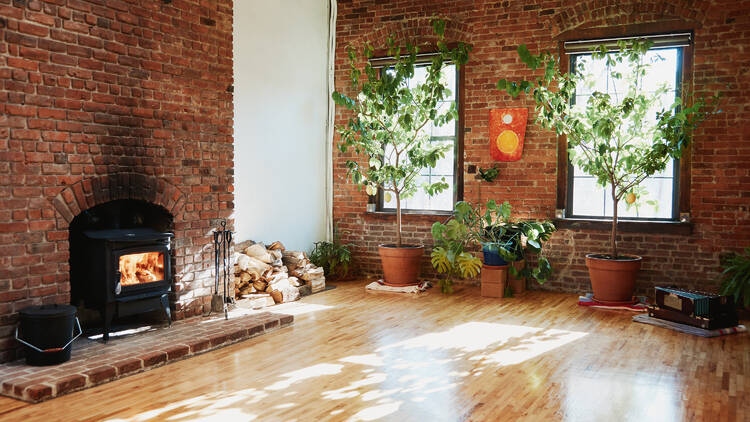 Take a cozy yoga class next to a fireplace
