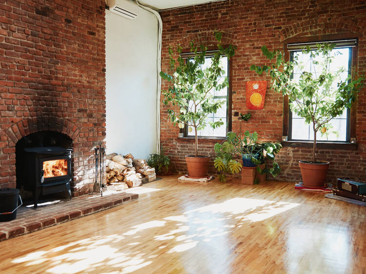 Take a cozy yoga class next to a fireplace