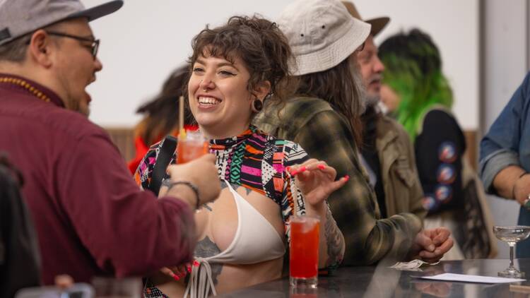People mingle at a singles mixer. People mingle at a singles mixer.