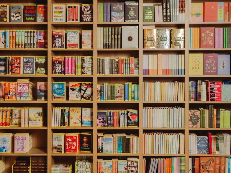 Bookshelf at WSOY Kirjakauppa in Helsinki featuring a visually rich selection of Finnish and international literature across genres. Bookshelf at WSOY Kirjakauppa in Helsinki featuring a visually rich selection of Finnish and international literature across genres.