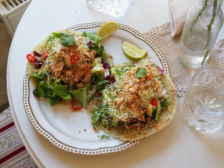 Fresh chicken tacos with sprouts, chili, and lime at Huvila restaurant in Oulu, Finland Fresh chicken tacos with sprouts, chili, and lime at Huvila restaurant in Oulu, Finland