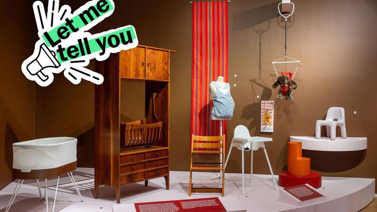 A collection of baby items in a museum exhibit.  A collection of baby items in a museum exhibit.