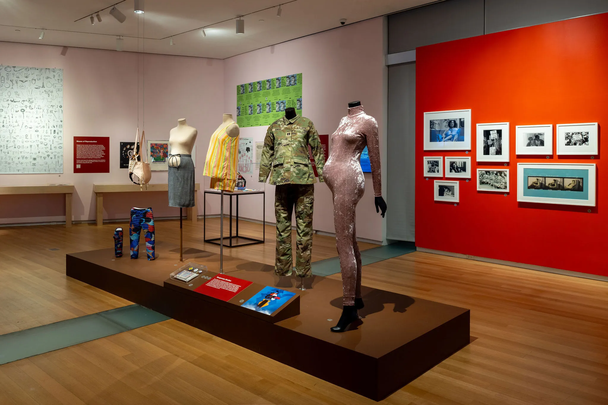 Mannequins show maternity clothing.