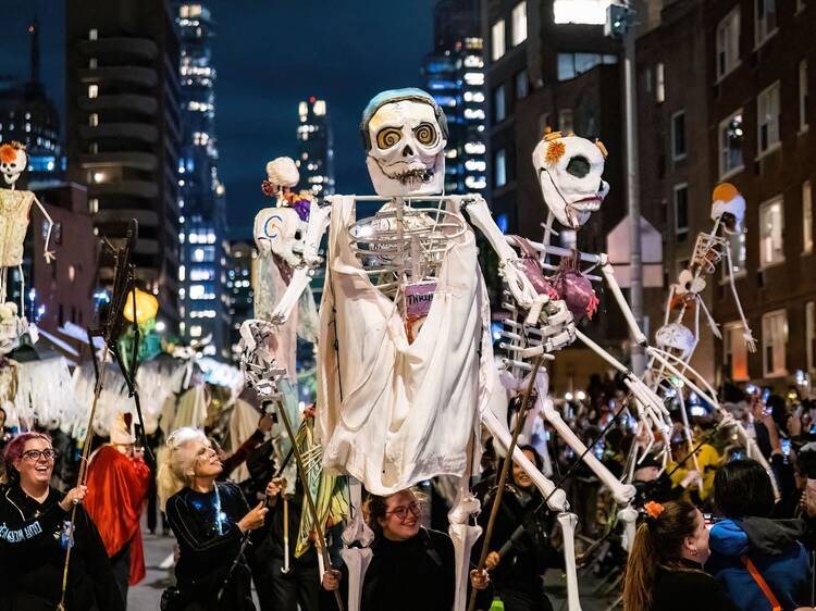 People wearing scary costumes at NYC Village Halloween parade