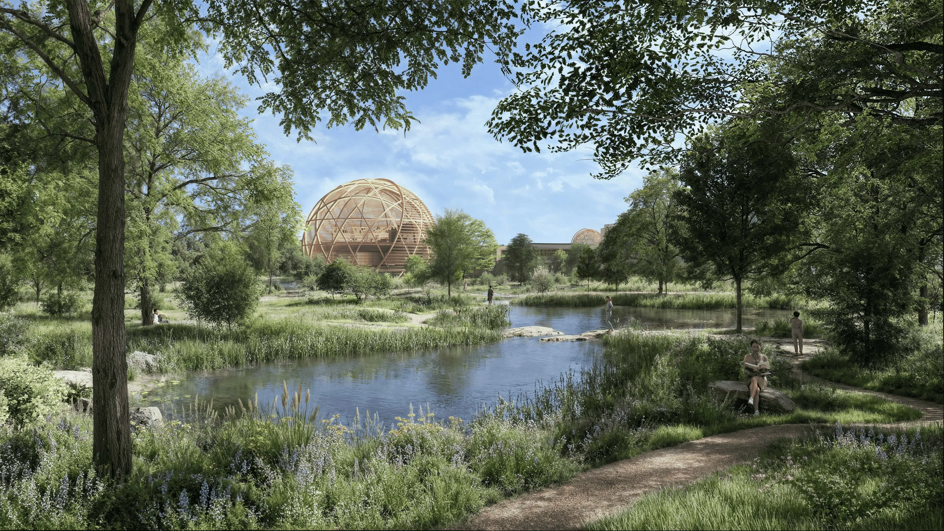 A domed auditorium anchors the whole development and provides a central venue for large-scale events, surrounded by lush greenery and water