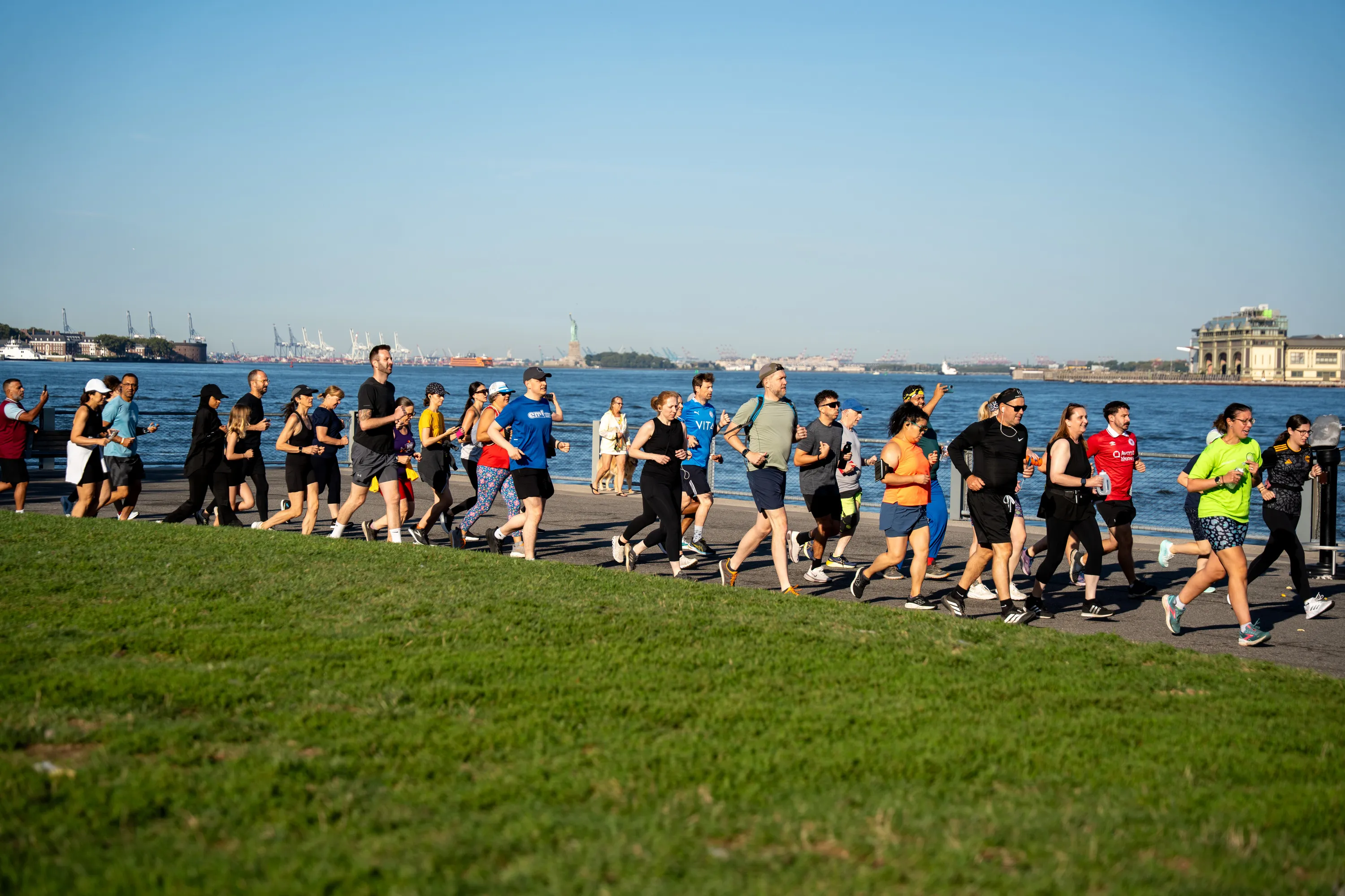 A group of people running a race along the East River in NYC