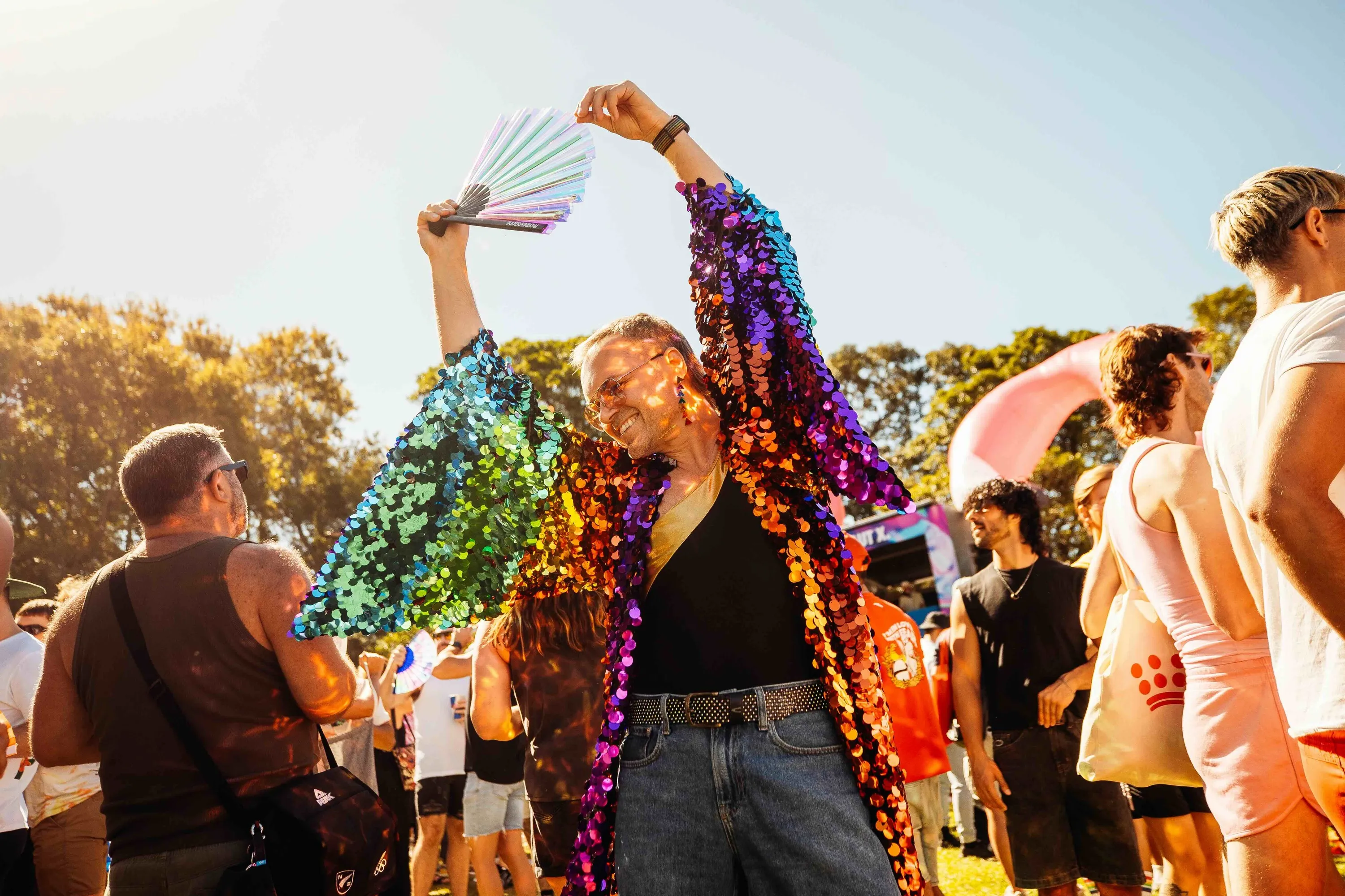 A person wearing a colourful jacket at Fair Day