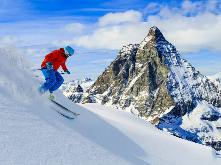 Skiing with amazing view of swiss famous mountains in beautiful winter snow. Matterhorn, Zermatt, Swiss Alps. Skiing with amazing view of swiss famous mountains in beautiful winter snow. Matterhorn, Zermatt, Swiss Alps.