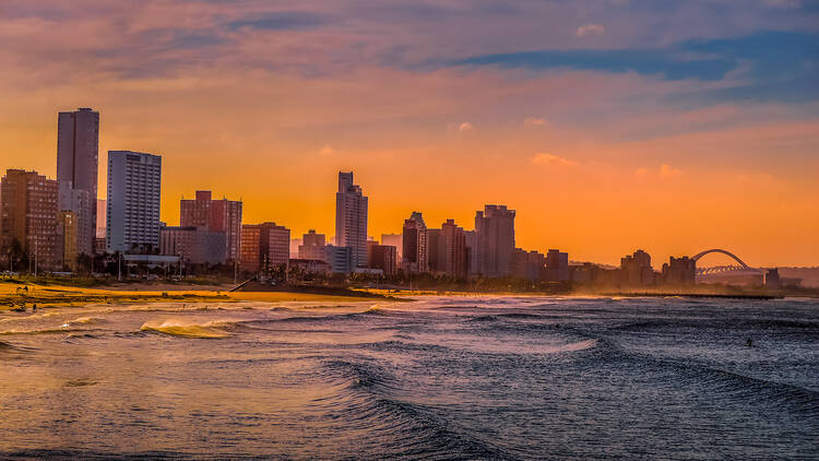 Durban golden mile beach with white sand and skyline KZN South Africa