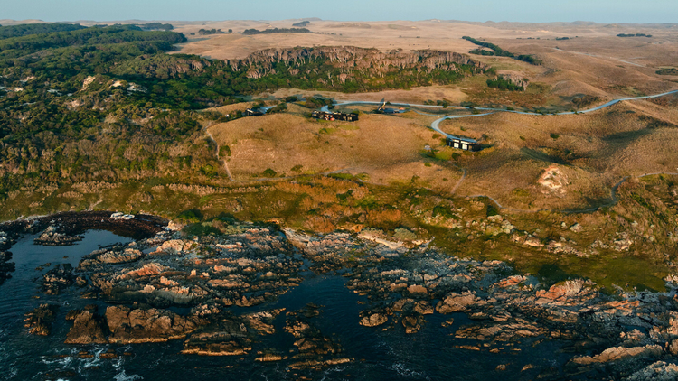 Kittawa Lodge Aerial view of lodges on rugged island