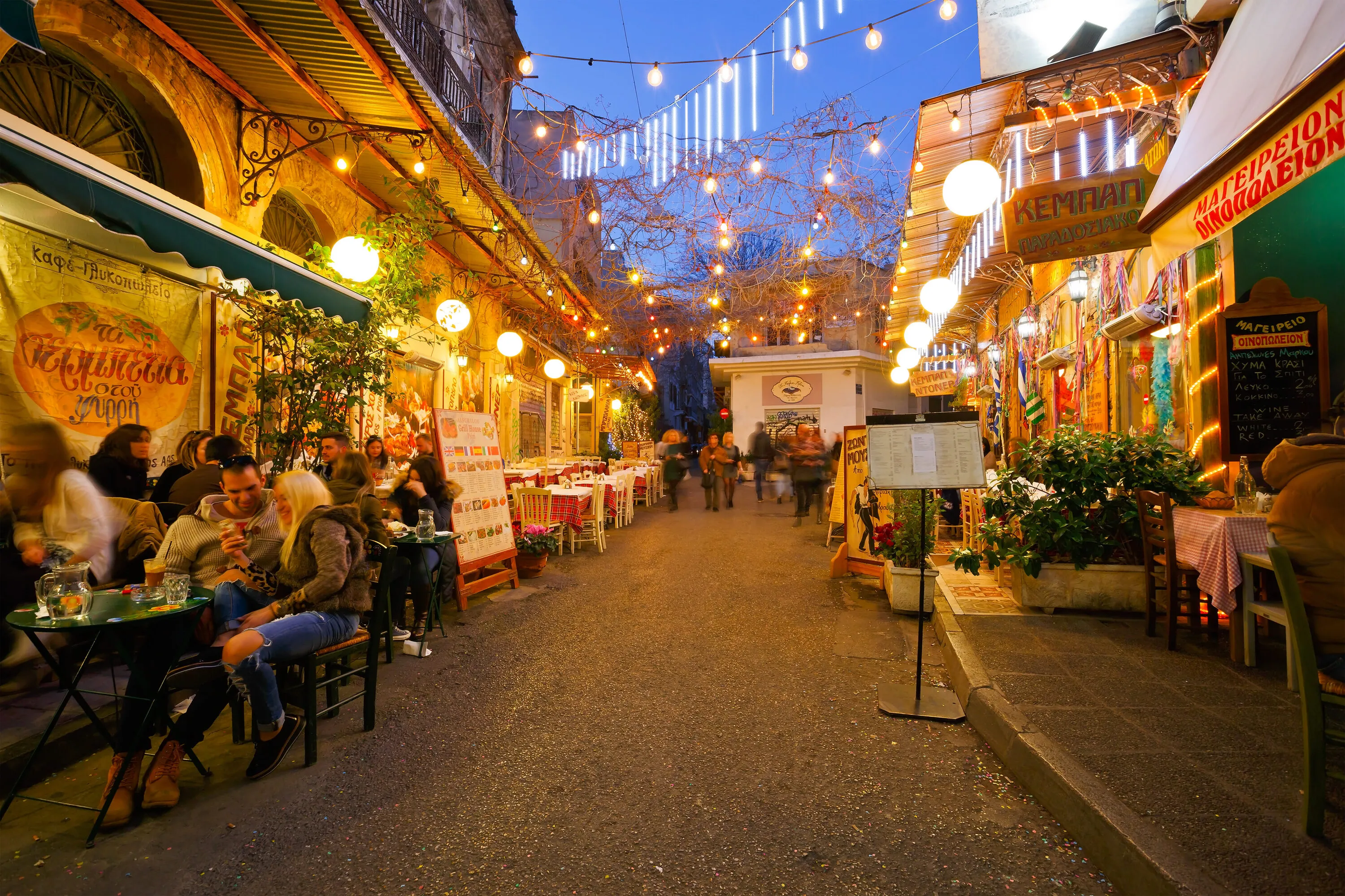 Restaurants and coffee shops in Psirri neighborhood near Heroes' square, Athens.