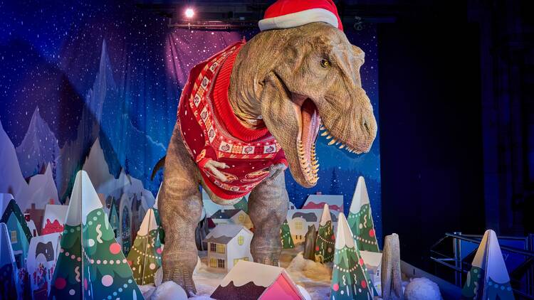 T-Rex wearing a Christmas jumper at the Natural History Museum T-Rex wearing a Christmas jumper at the Natural History Museum