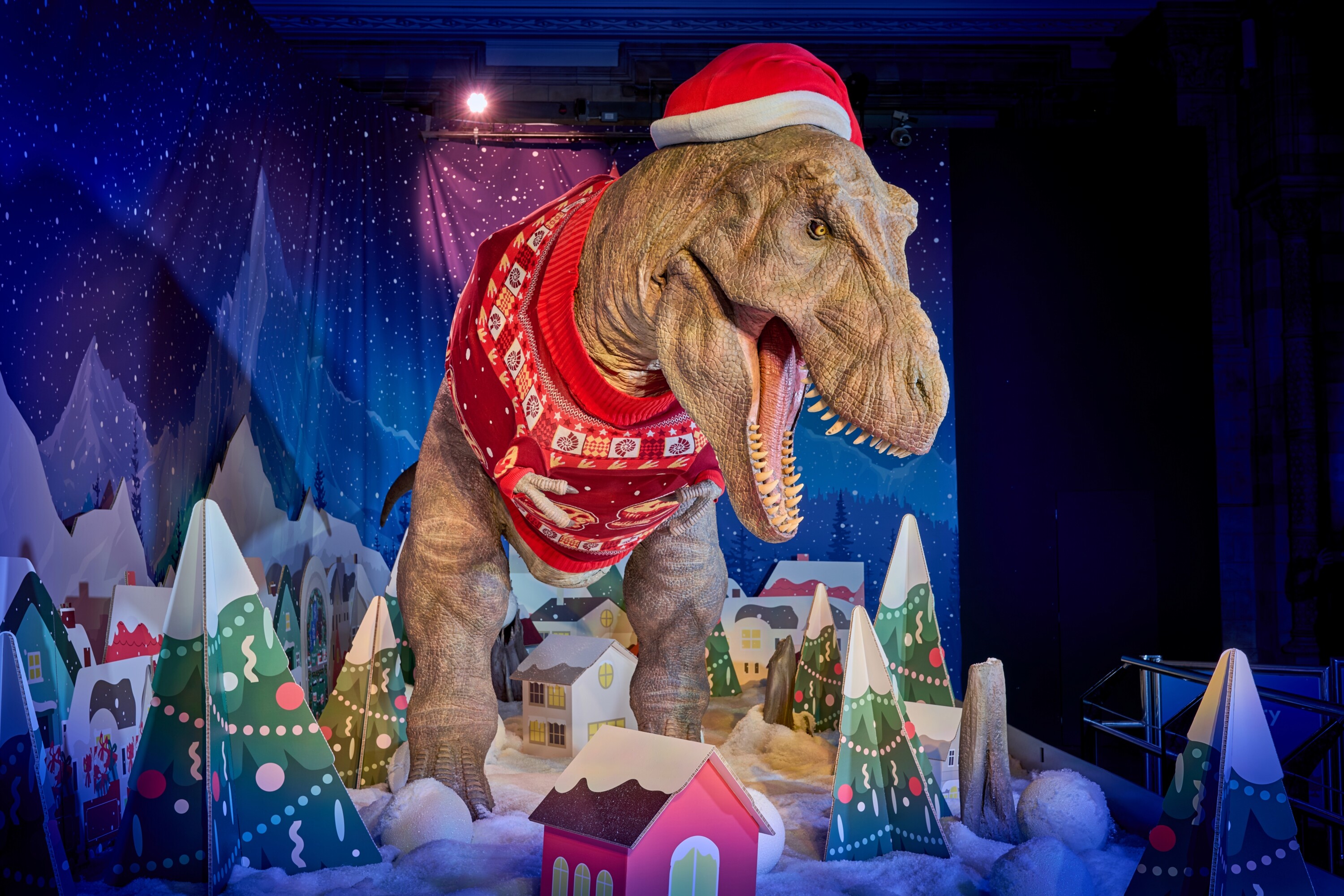 In pictures: the Natural History Museum's T-Rex has a jazzy new Christmas jumper for the 2025 festive season