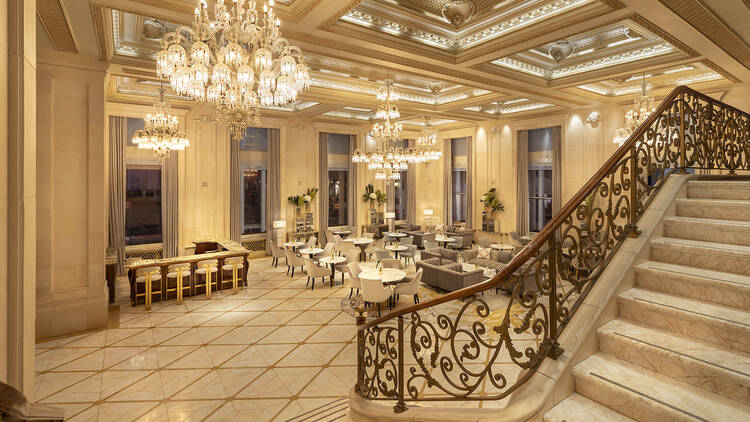 The lobby of the Plaza hotel with a restaurant.