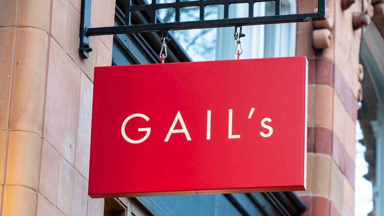 Photo of a red sign outside that says 'Gail's' on it