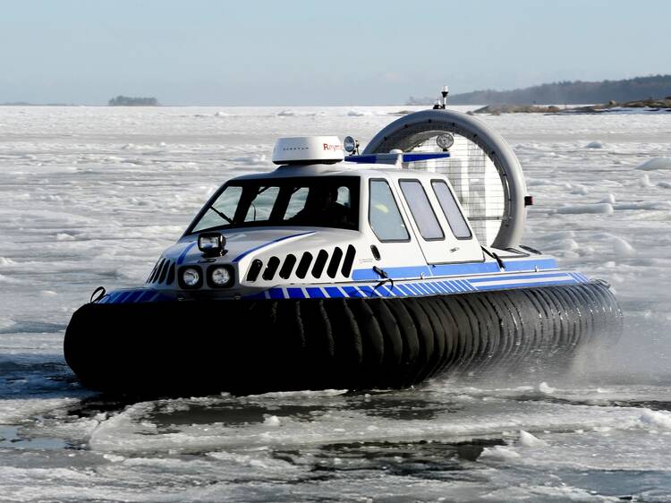 Glide across the ice in a hovercraft