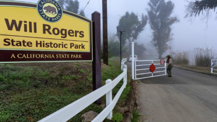 The sign for Will Rogers State Historic Park.