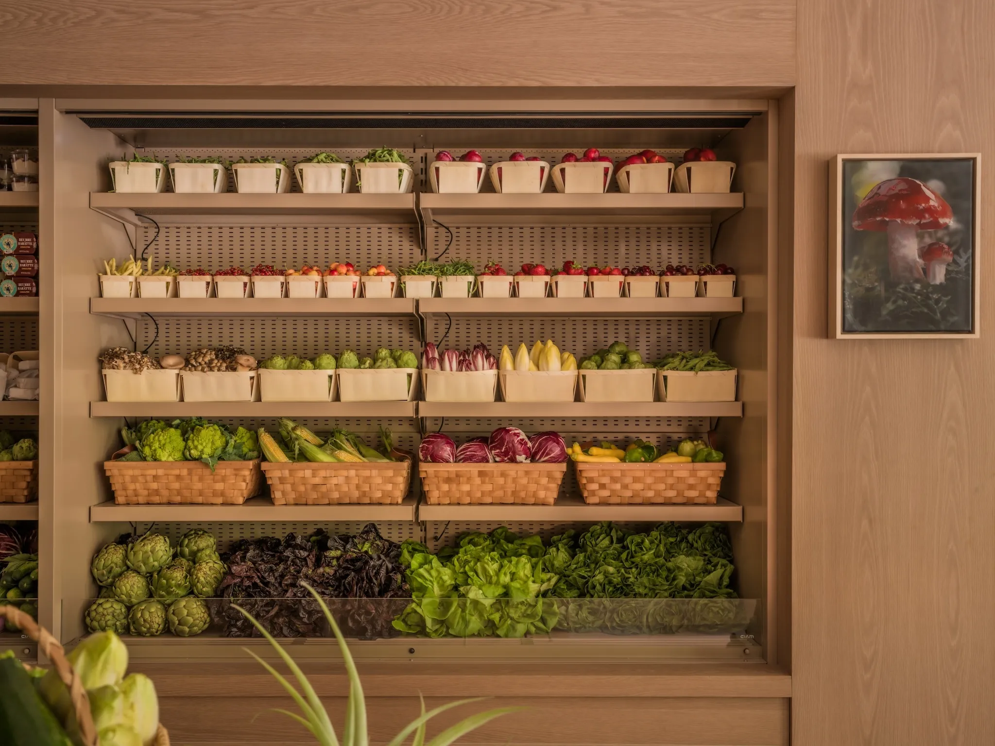 Rows of vegetables on display inside gourmet grocer Meadow Lane