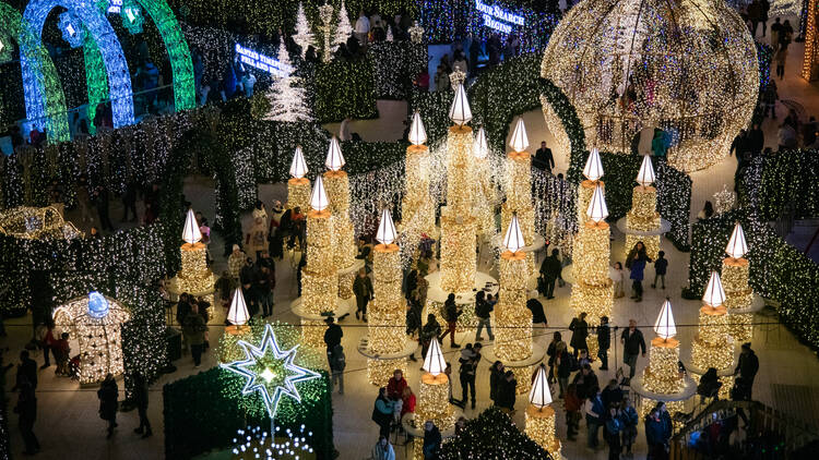 Oversized illuminated candles at Enchant LA.