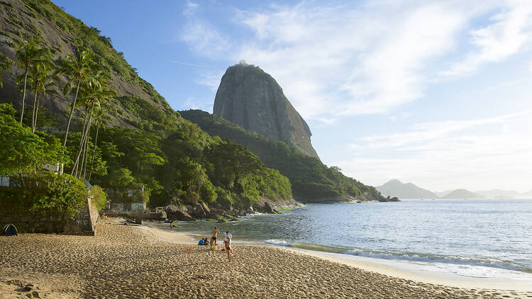 Beach with Sugarloaf Mountain in background, Rio de Janeiro, Brazil Beach with Sugarloaf Mountain in background, Rio de Janeiro, Brazil