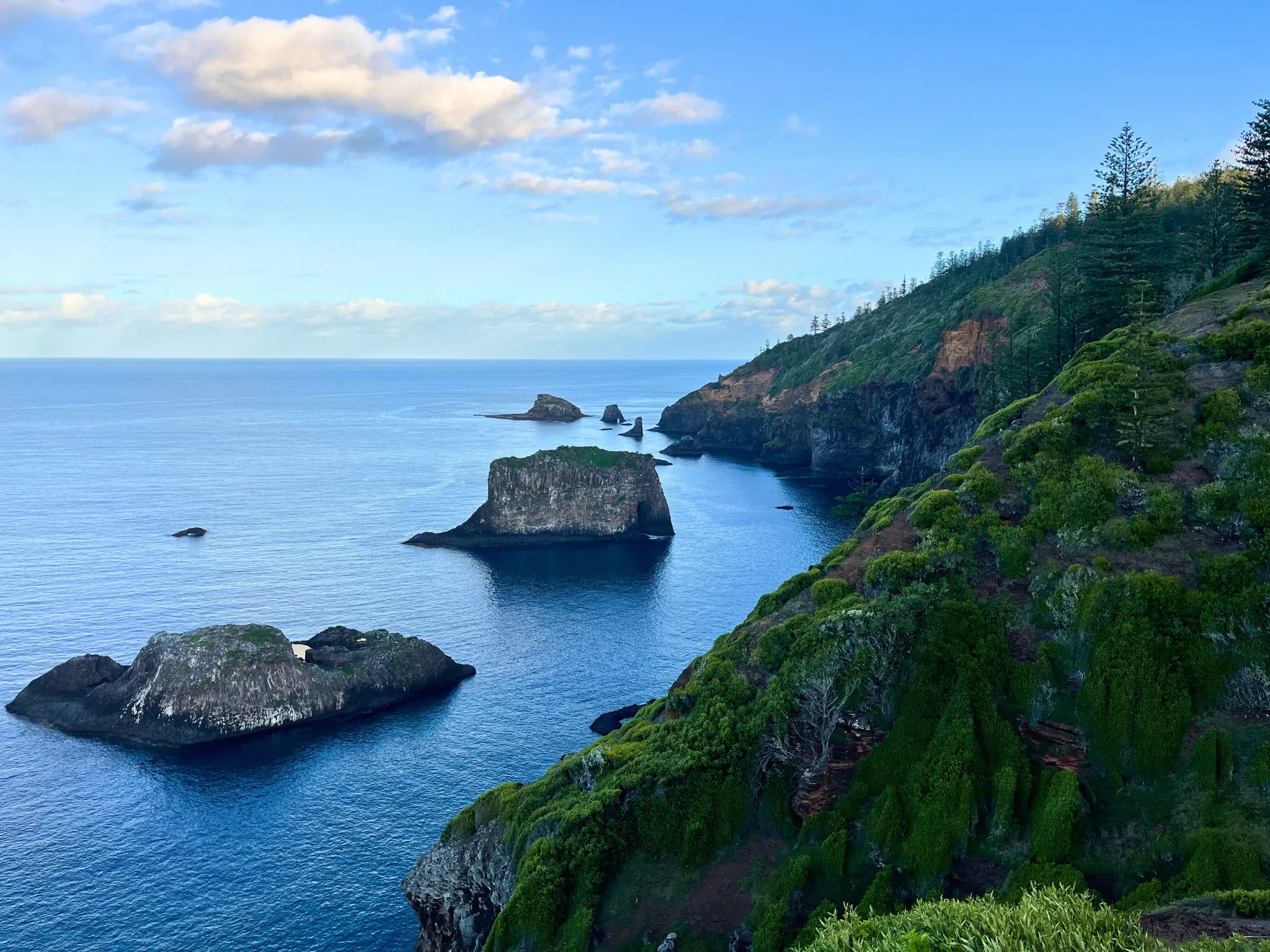 Cliff view of big rocks in water