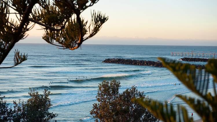 Duranbah Beach, Tweed Heads Surfers catching a morning wave at Duranbah Beach, Tweed Heads.