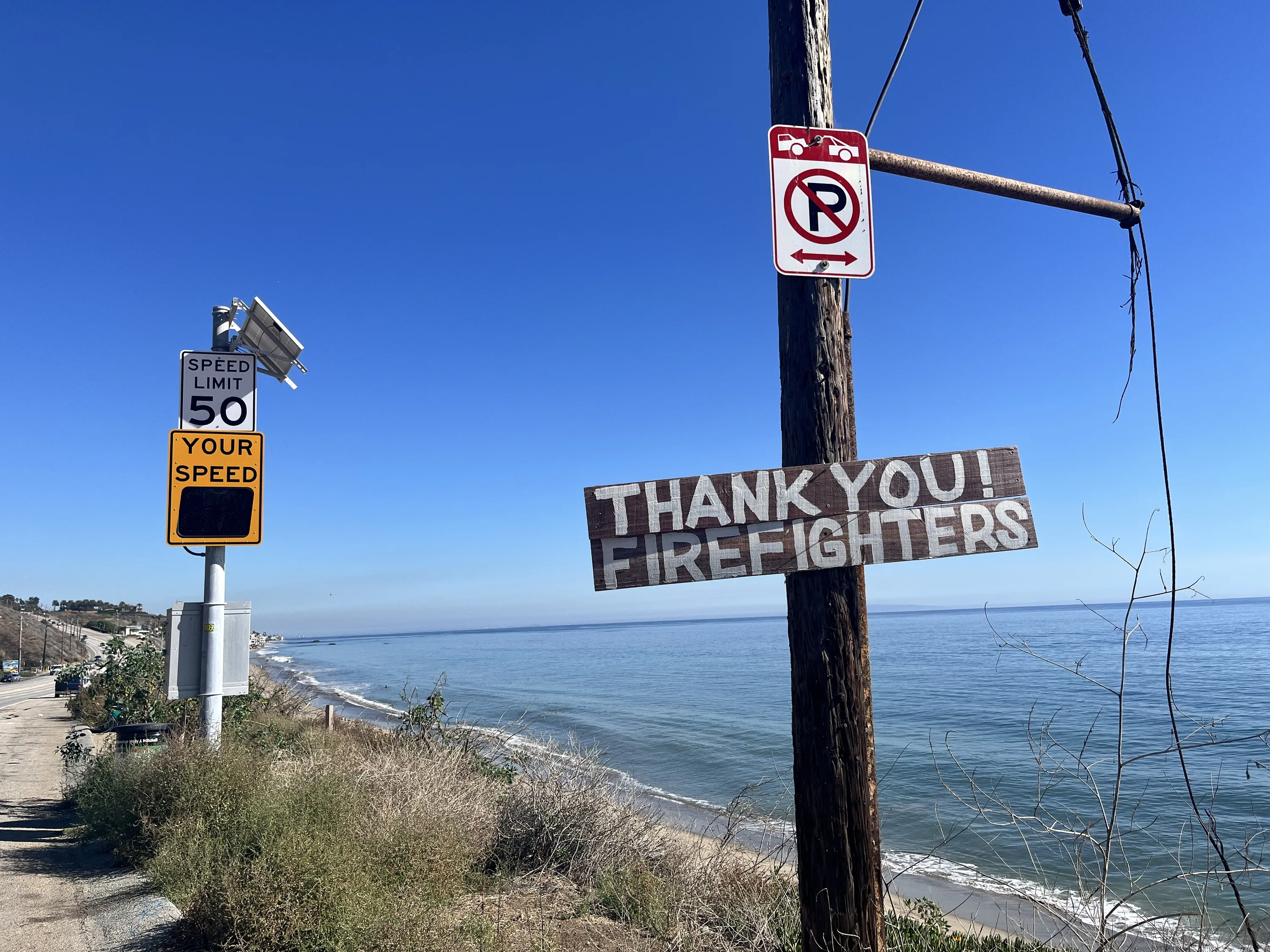 A sign on Pacific Coast Highway in Malibu reads, "Thank you firefighters!"