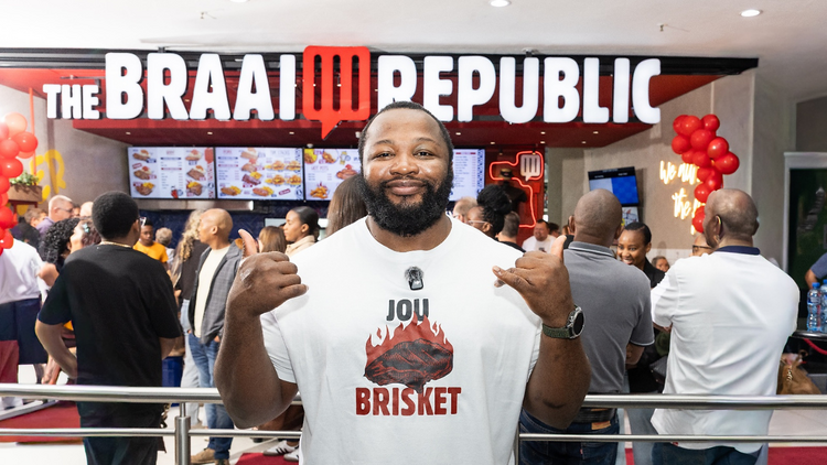 "Ox" Nché outside the first Braai Republic restaurant in Northgate