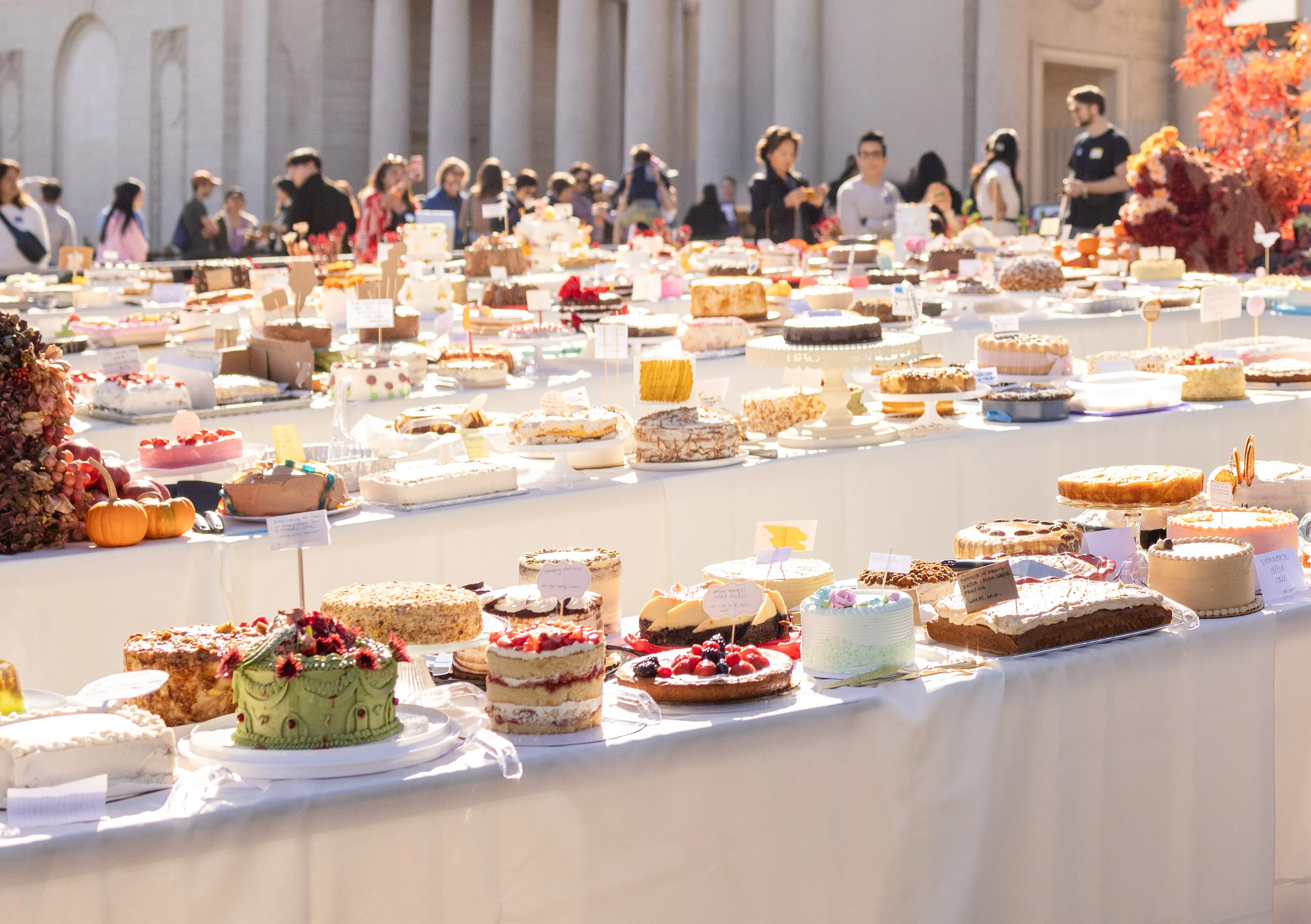 Tables filled with cakes.