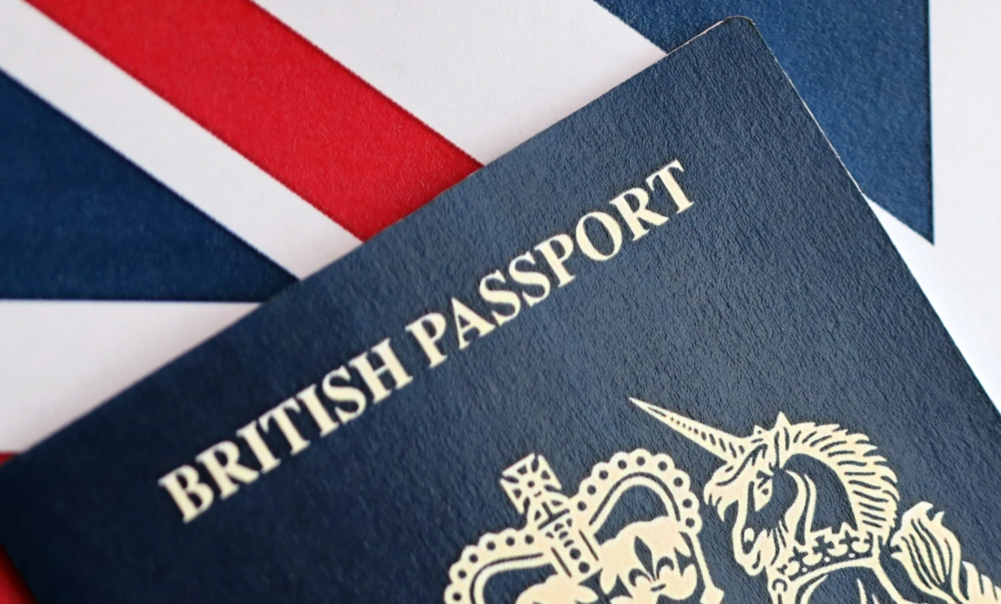 UK passport on Union Jack background