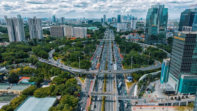 Jakarta, Indonesia - March 16, 2024: The bustling Semanggi Interchange, a key transportation hub in Jakarta, captures the city's dynamic flow of traffic and modern infrastructure.