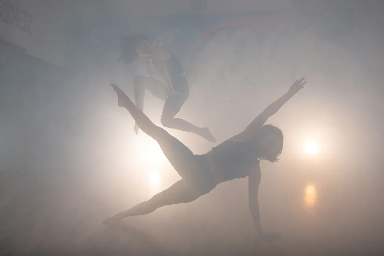 Group of young hip-hop dancers performing on the stage