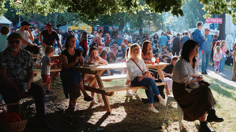 Coburg Night Market People at Coburg Night Market sitting outside.