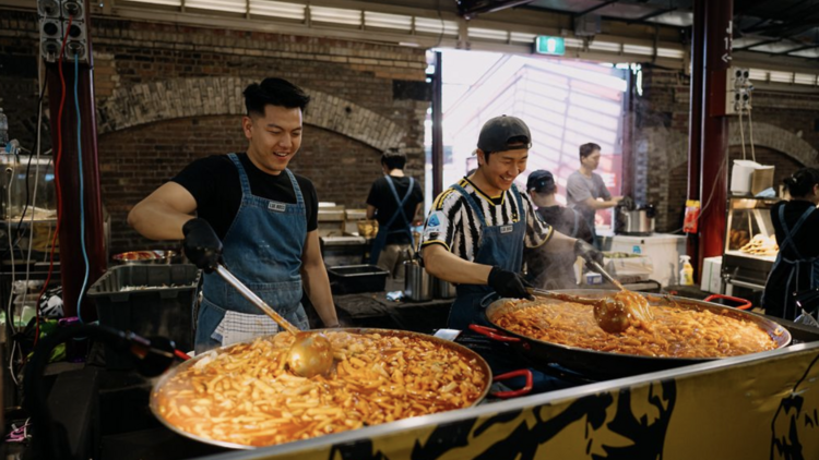 Queen Victoria Summer Night Market people cooking at outdoor market