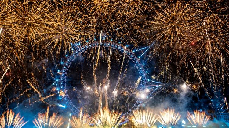 The London Eye amid New Year’s Eve fireworks viewed from across the river