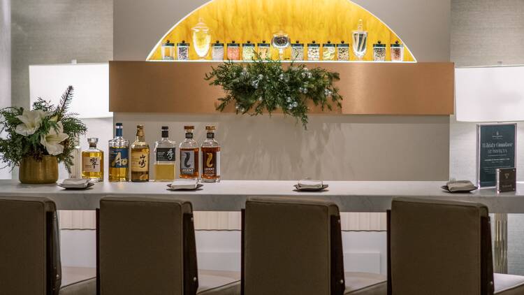 Sip on a variety of whiskeys at a luxury hotel bar