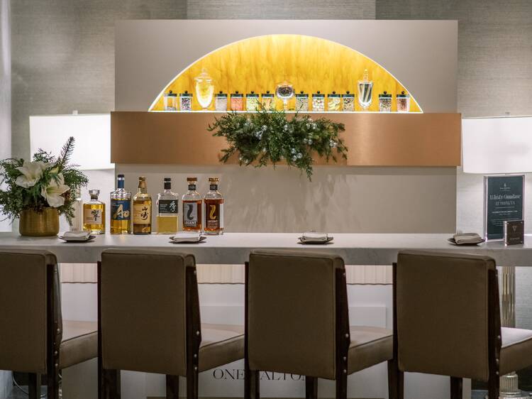 Sip on a variety of whiskeys at a luxury hotel bar