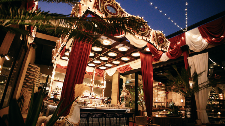 Watch Bou Bou Bar reimagined as carousel warmed by festive lights greeting you instantly Watch Bou Bou Bar reimagined as carousel warmed by festive lights greeting you instantly