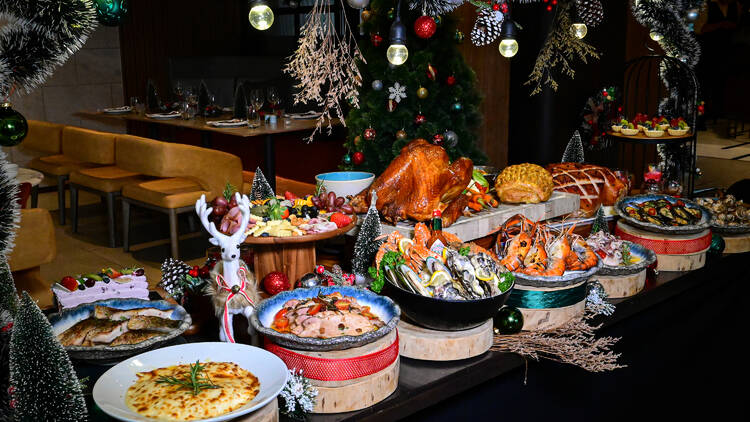 Build ambitious plates wandering from station to station at Twenty & One's gleaming Christmas buffet Build ambitious plates wandering from station to station at Twenty & One's gleaming Christmas buffet