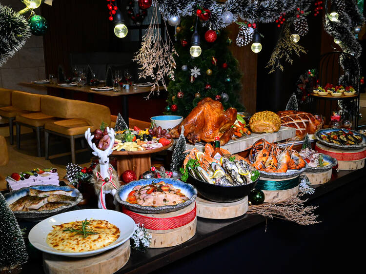 Build ambitious plates wandering from station to station at Twenty & One's gleaming Christmas buffet Build ambitious plates wandering from station to station at Twenty & One's gleaming Christmas buffet