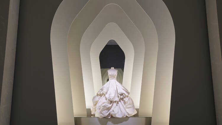 A Vivienne Westwood wedding gown on display at Westwood | Kawakubo.