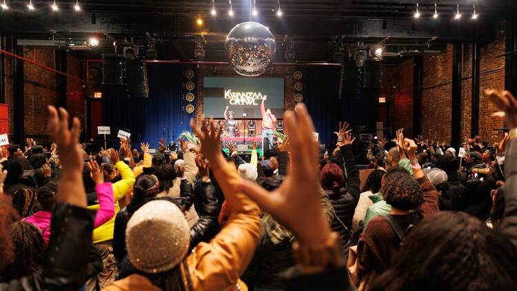 A group of people in front of the stage