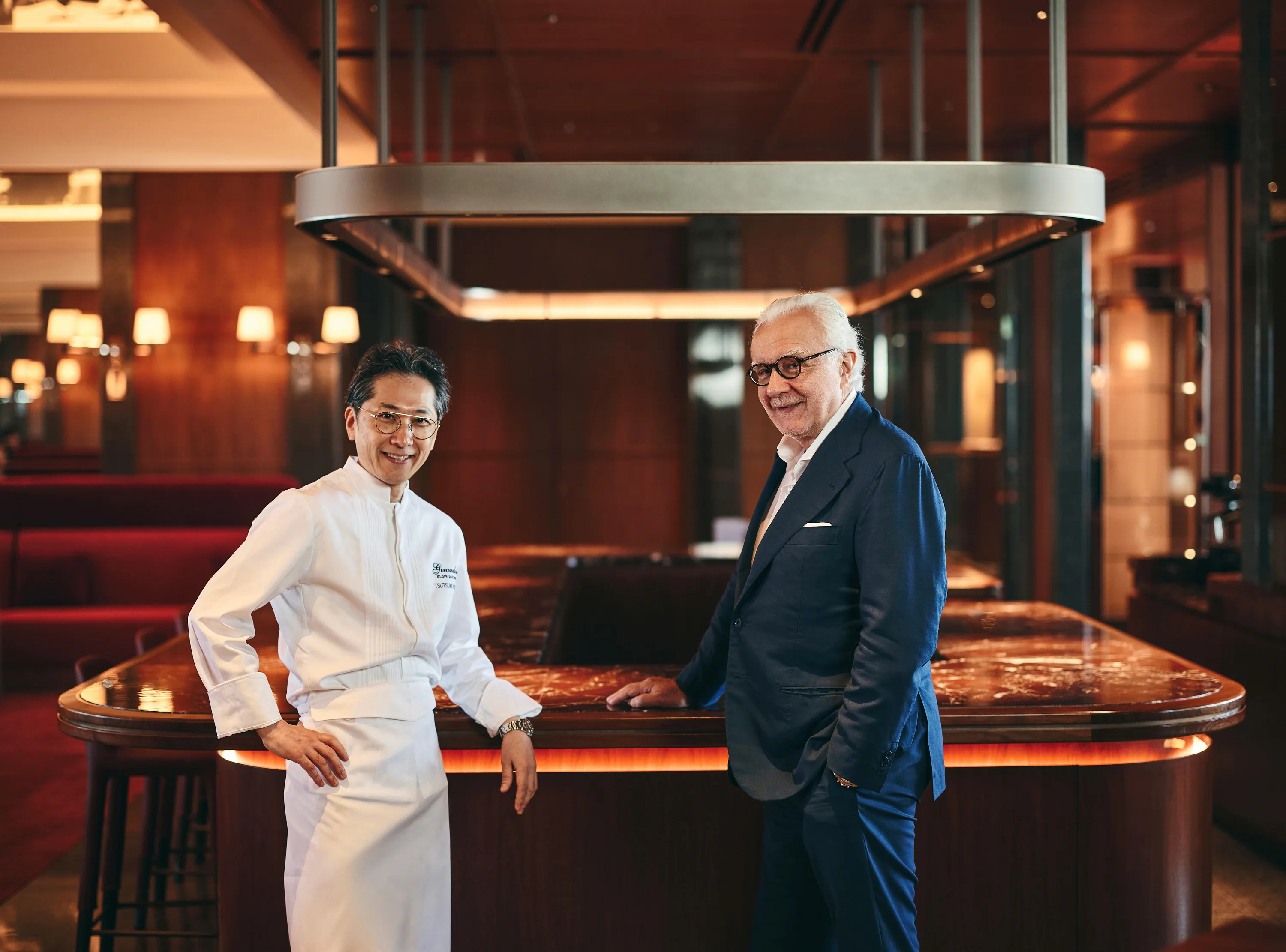 Chef Kojiro Tsutsumi (left) and Alain Ducasse (right)